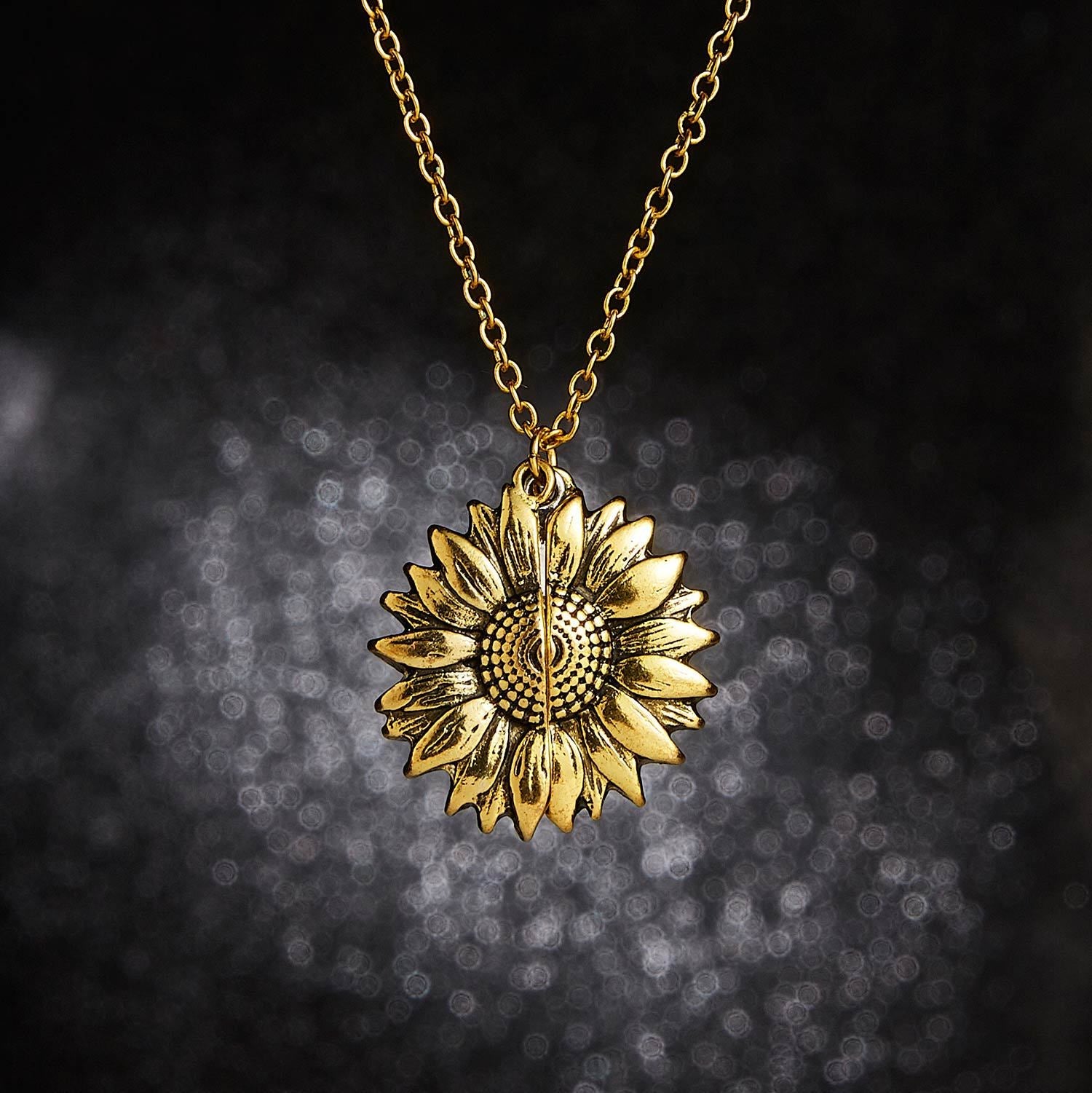 You Are My Sunshine Open Sunflower Necklace featuring a delicate sunflower pendant in 14K gold plating on an 18.50-inch chain.