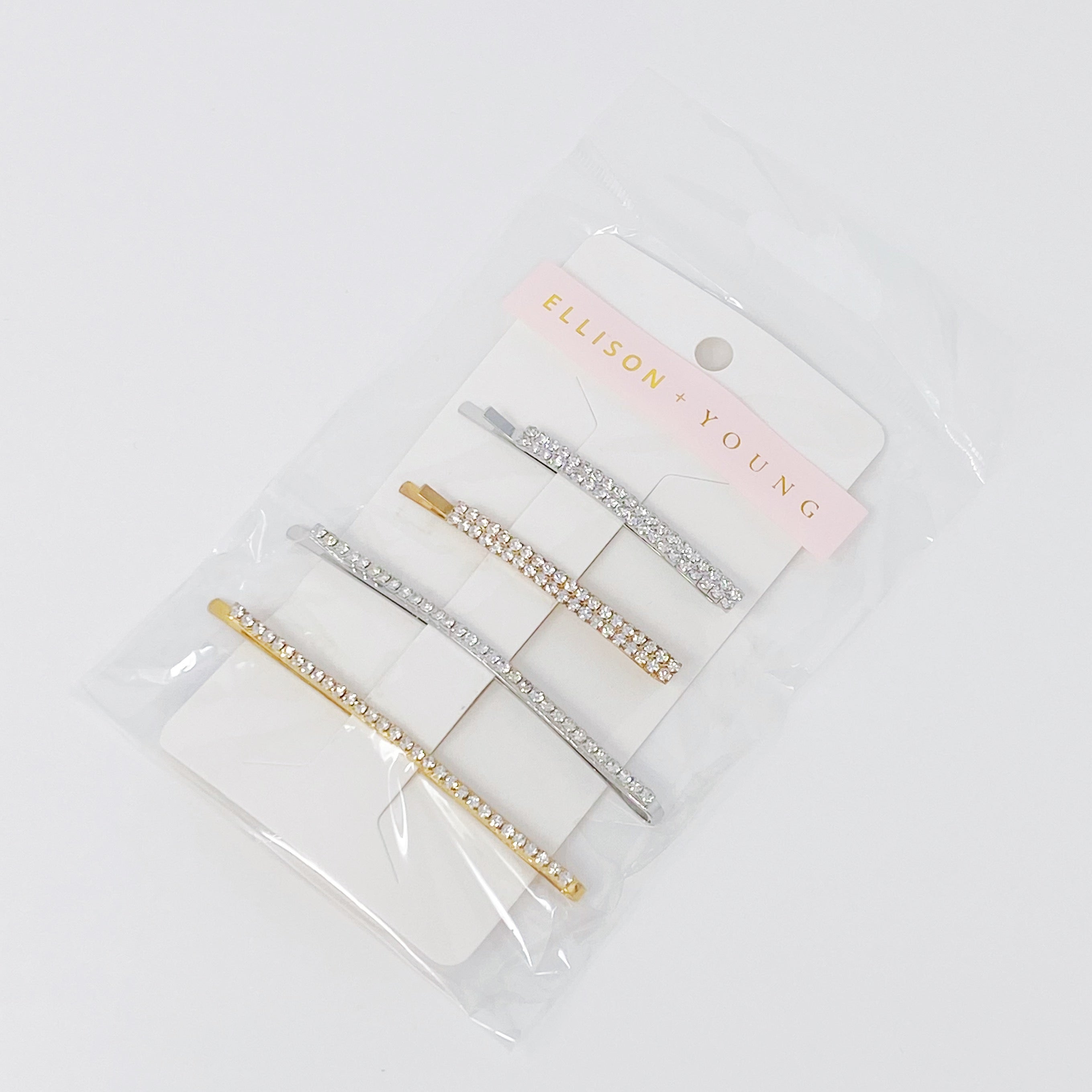 Your Shiness CZ Hair Pin Set featuring 4 shiny bobby pins in gold and silver tones, displayed in a clear cello bag.