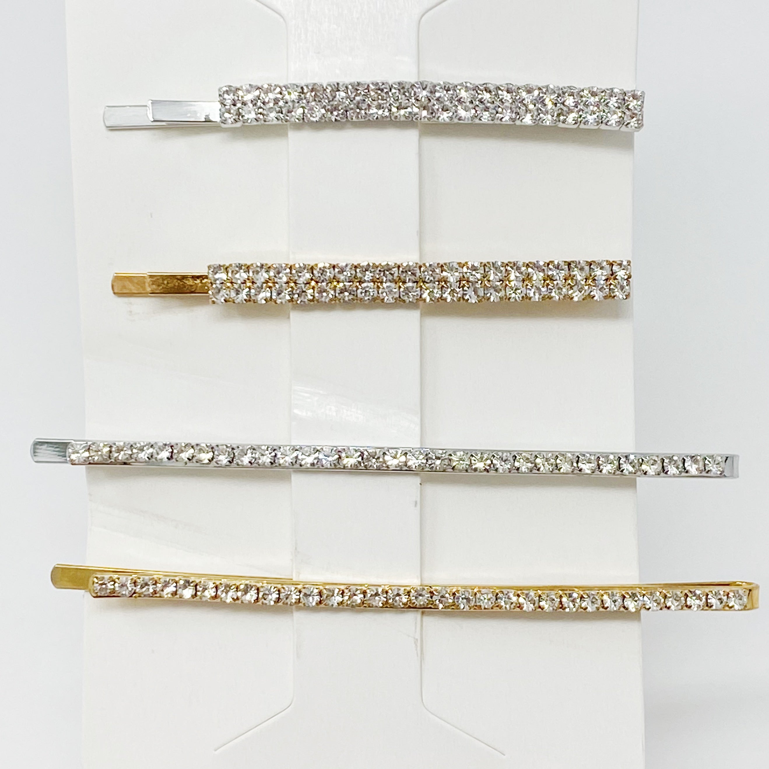 Your Shiness CZ Hair Pin Set featuring 4 shiny bobby pins in gold and silver tones, displayed in a clear cello bag.