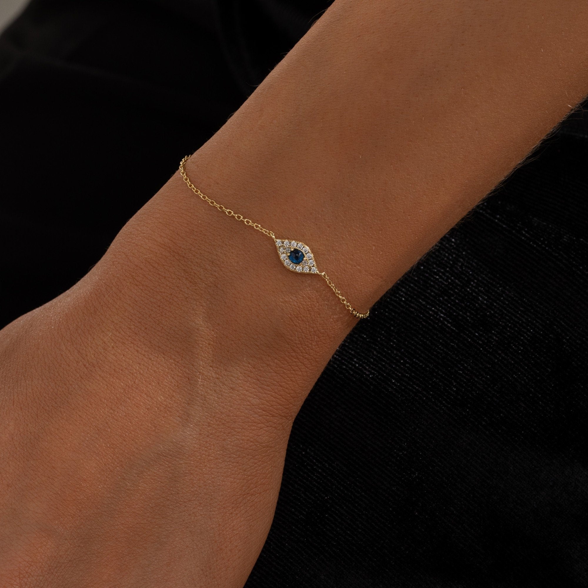 Zahra Evie Eye Bracelet featuring sterling silver and 18K gold plating with a unique eye design.