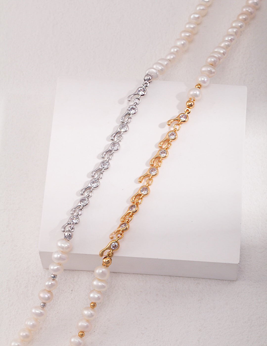 Elegant Zircon Chain Splice Natural Pearl Necklace featuring natural pearls, zircon stones, and gold vermeil accents, displayed on a soft background.