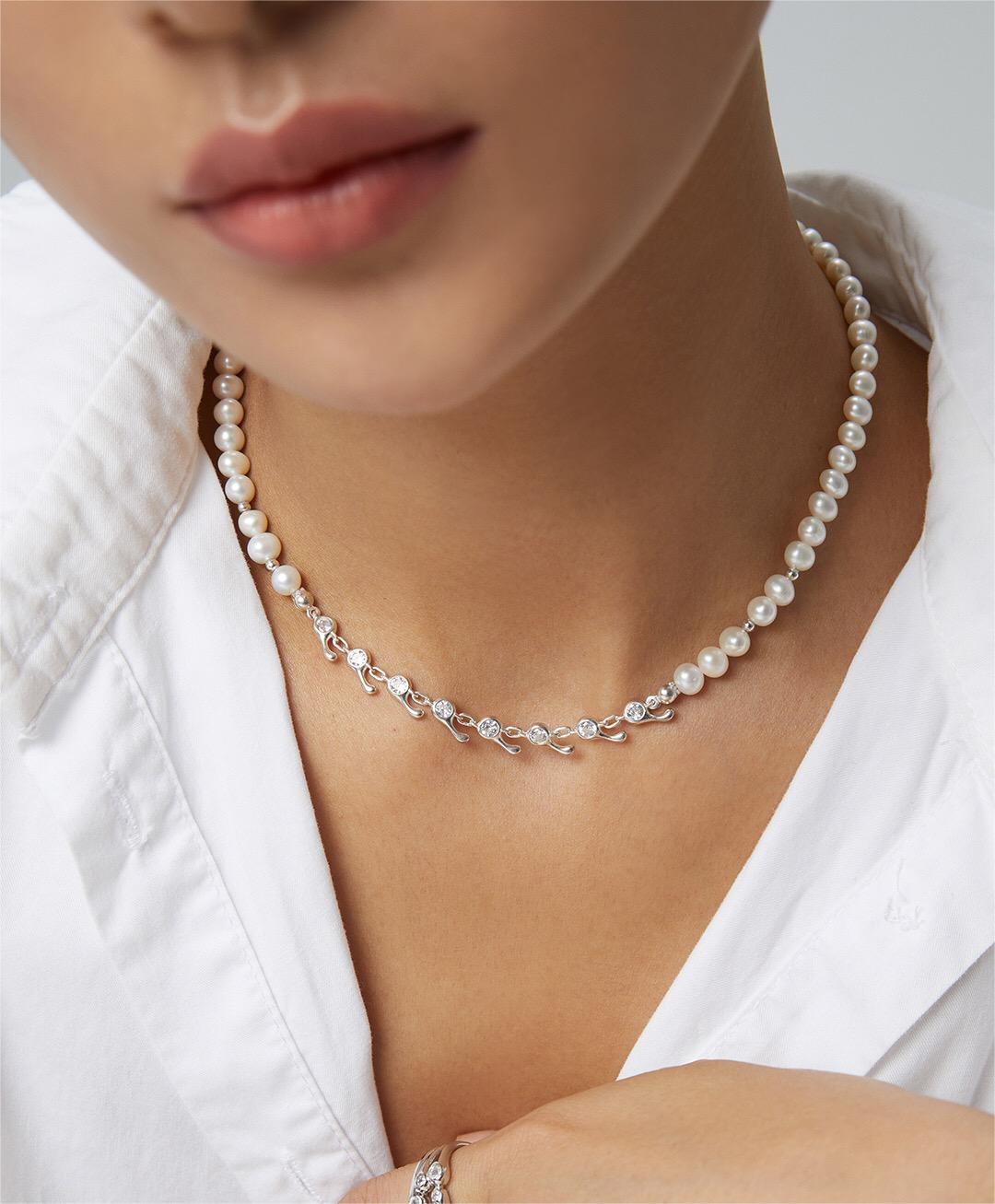 Elegant Zircon Chain Splice Natural Pearl Necklace featuring natural pearls, zircon stones, and gold vermeil accents, displayed on a soft background.