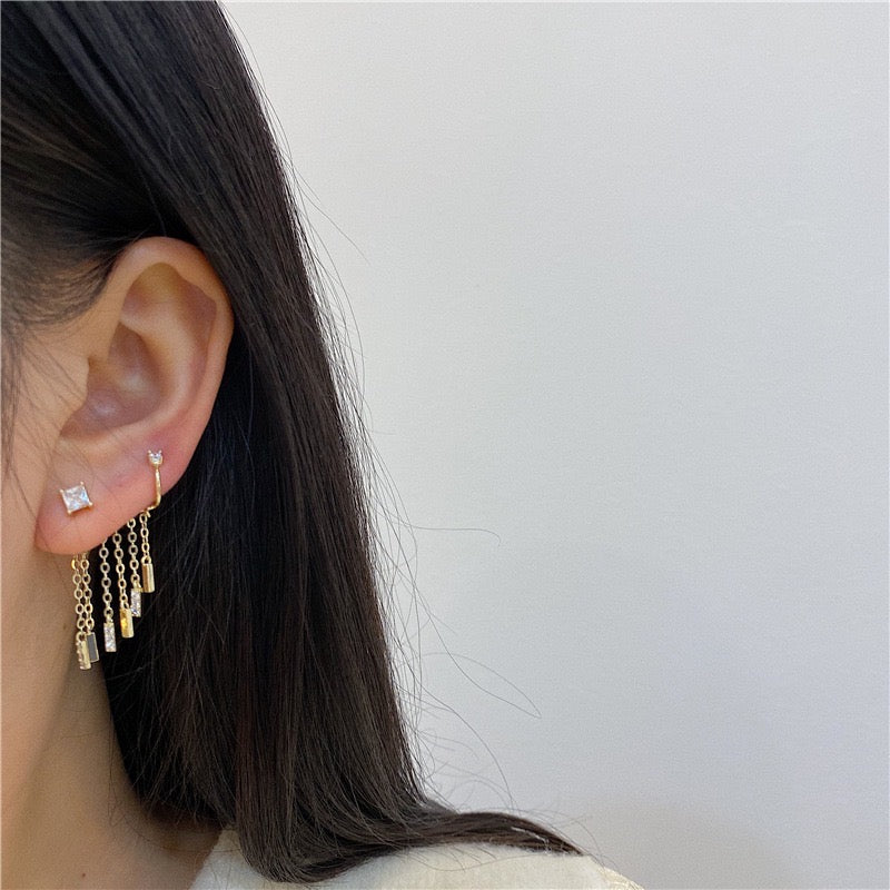 Zircon Gradual Tassels Ear Stud and Clip featuring alloy and rhinestones, showcasing elegant design and sparkling details.