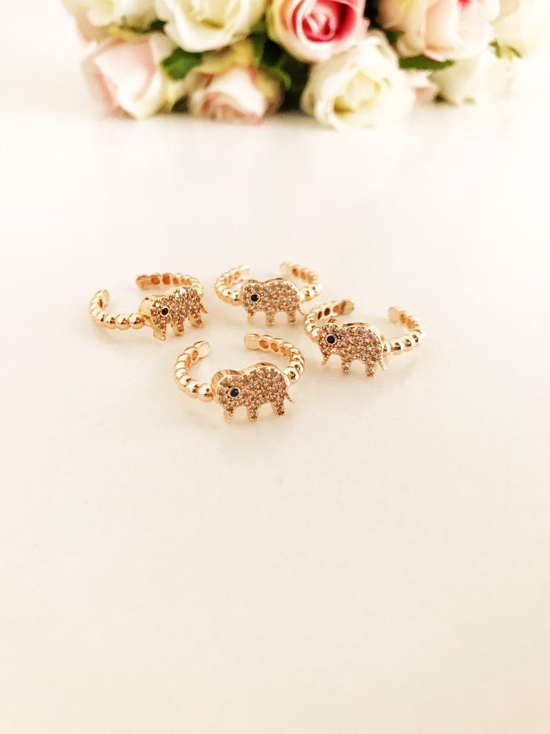 A beautiful adjustable Zirconia Elephant Ring featuring rose gold and sparkling zirconia beads, symbolizing good luck and charm.