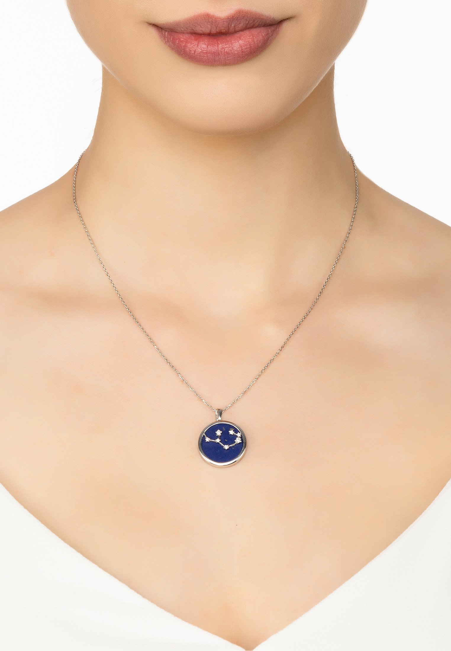 Zodiac Lapis Lazuli Gemstone Star Constellation Pendant Necklace featuring a deep blue lapis lazuli stone and sparkling cubic zirconia stars.