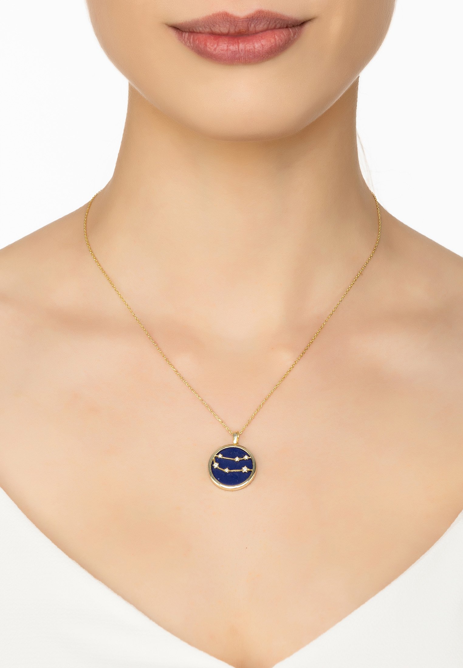 Zodiac Lapis Lazuli Gemstone Star Constellation Pendant Necklace in gold, featuring a blue lapis lazuli stone and sparkling cubic zirconia.