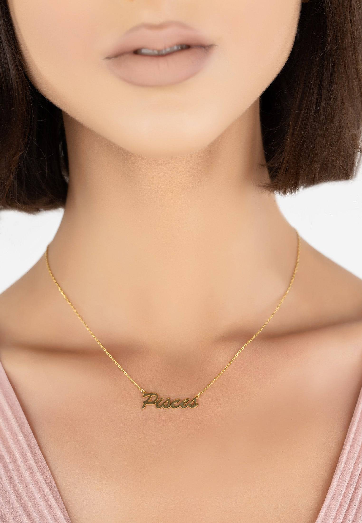 Gold Pisces Zodiac Star Sign Name Necklace, elegantly crafted with a delicate script design, perfect for layering or as a personalized gift.