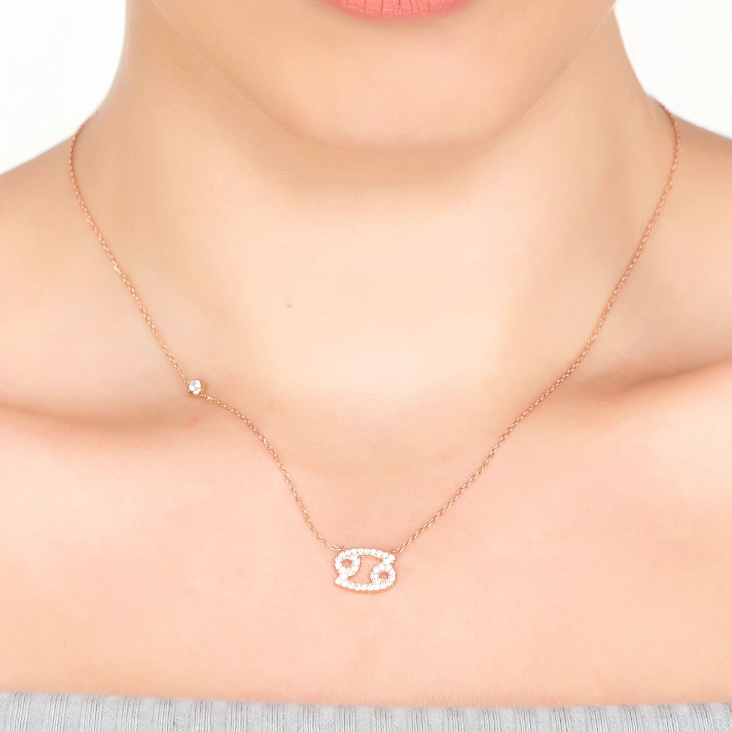 Silver Zodiac Star Sign Pendant Necklace for Cancer with white zircons, featuring an adjustable chain and lobster clasp.