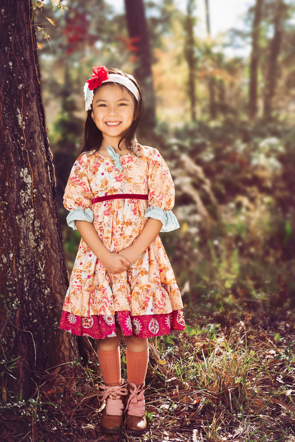 Amber Dreams Dress featuring autumn leaves and whimsical polka dots, perfect for little girls.