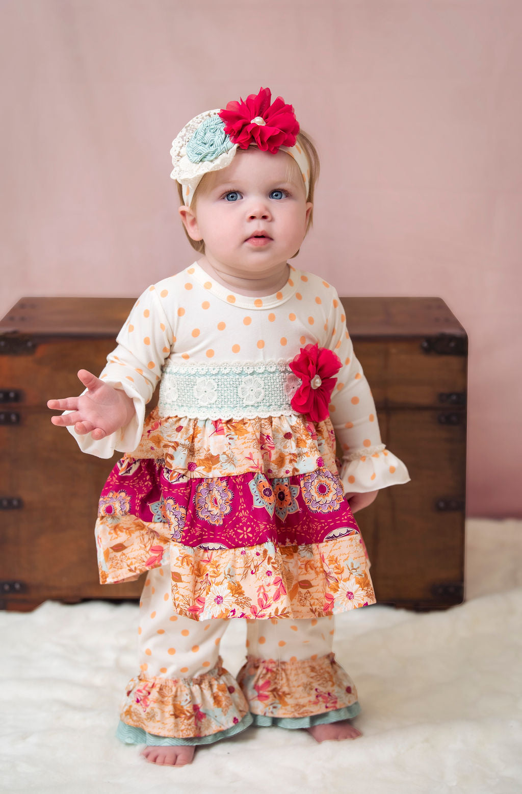 Amber Dreams Romper featuring autumn leaves and whimsical polka dots, designed for little girls.