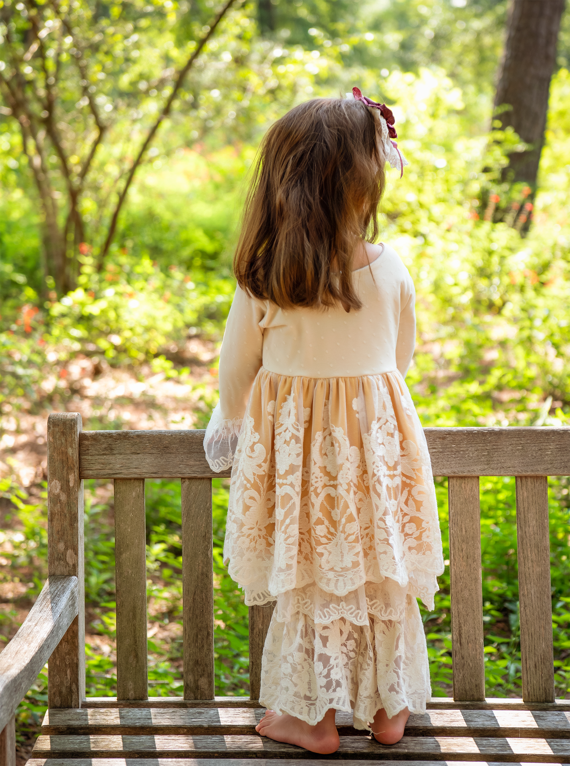 Amelia Swing Set featuring a stylish mustard color and classic design, perfect for outdoor play.