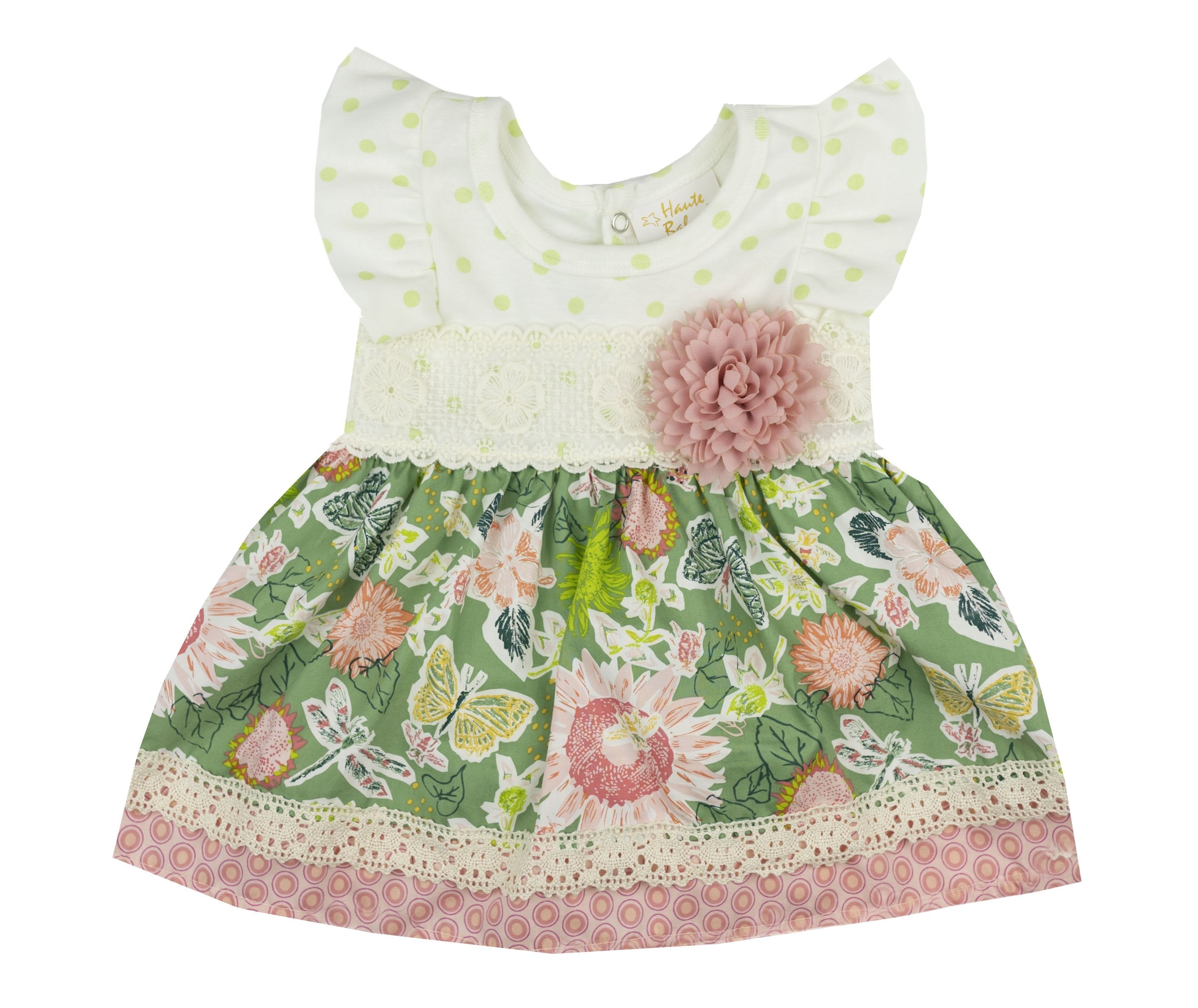 April Meadow Diaper Dress in green with attached diaper cover, designed for comfort and easy diaper changes.