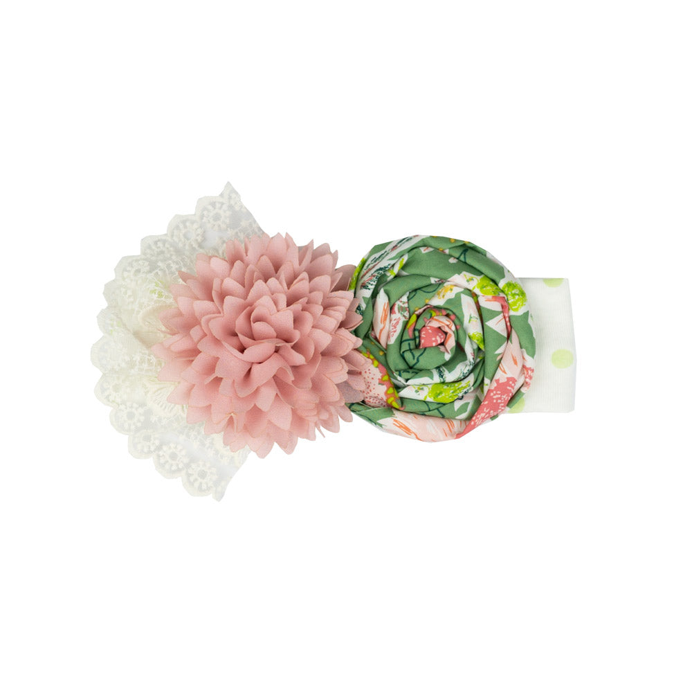 April Meadow Headband featuring a vibrant floral design, perfect for stylish hair accessories.