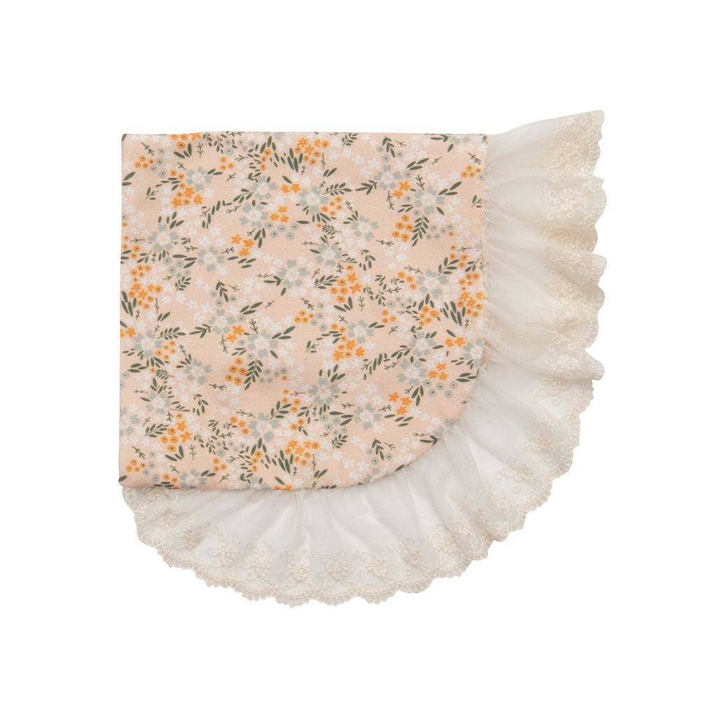 Avas Garden Blanket featuring cute pastel oranges and elegant lace detailing, perfect for home decor and cozy evenings.