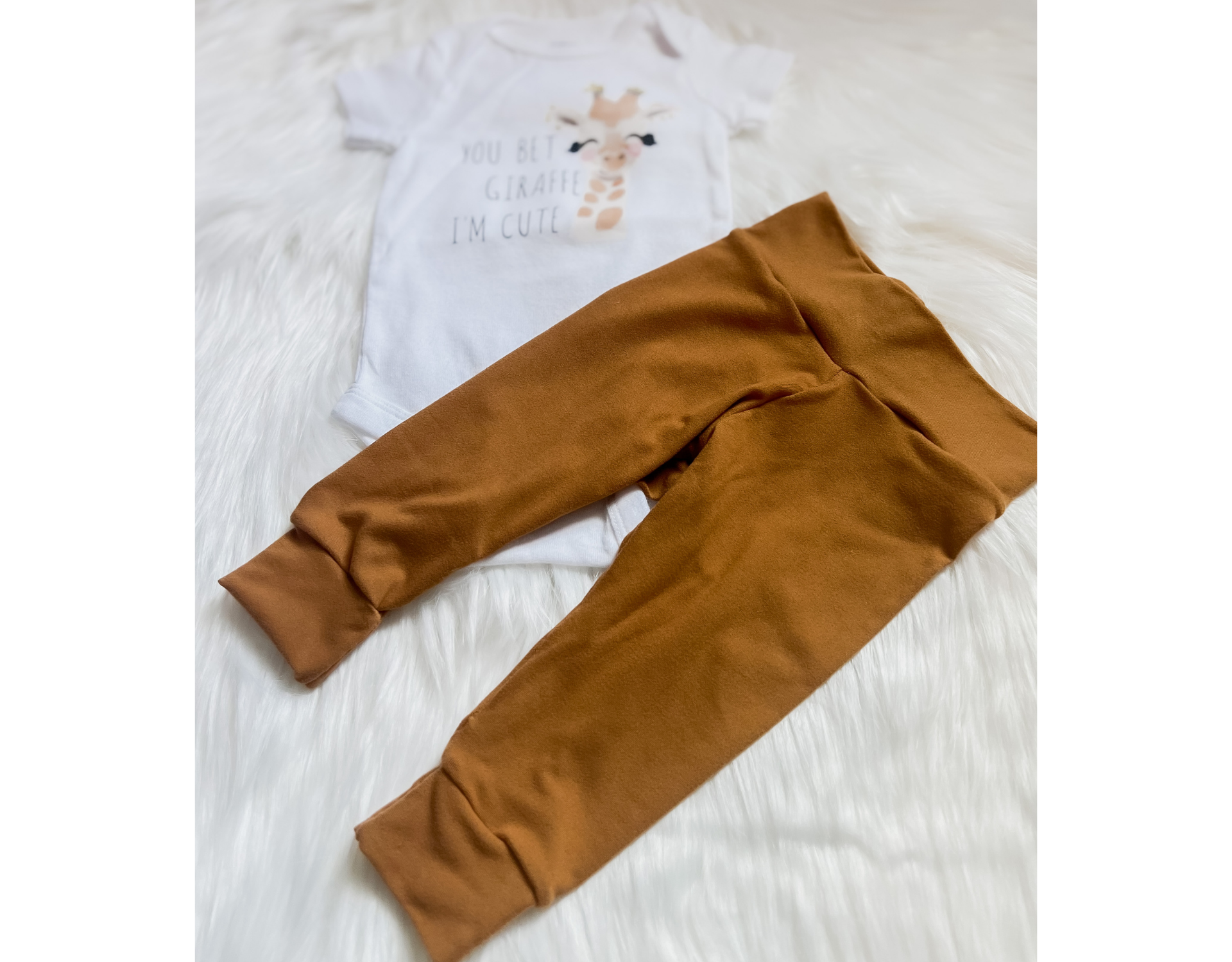 Adorable Baby Giraffe Outfit featuring soft leggings and a cotton bodysuit, perfect for infants.