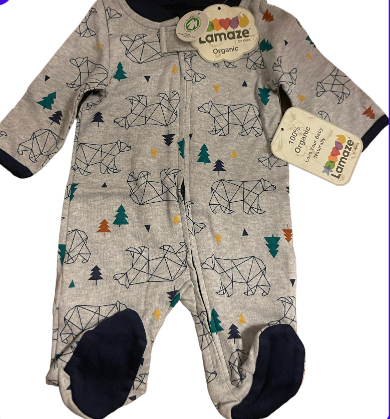 A collection of soft and cozy 100% organic baby sleepers in various colors and sizes, perfect for infants.