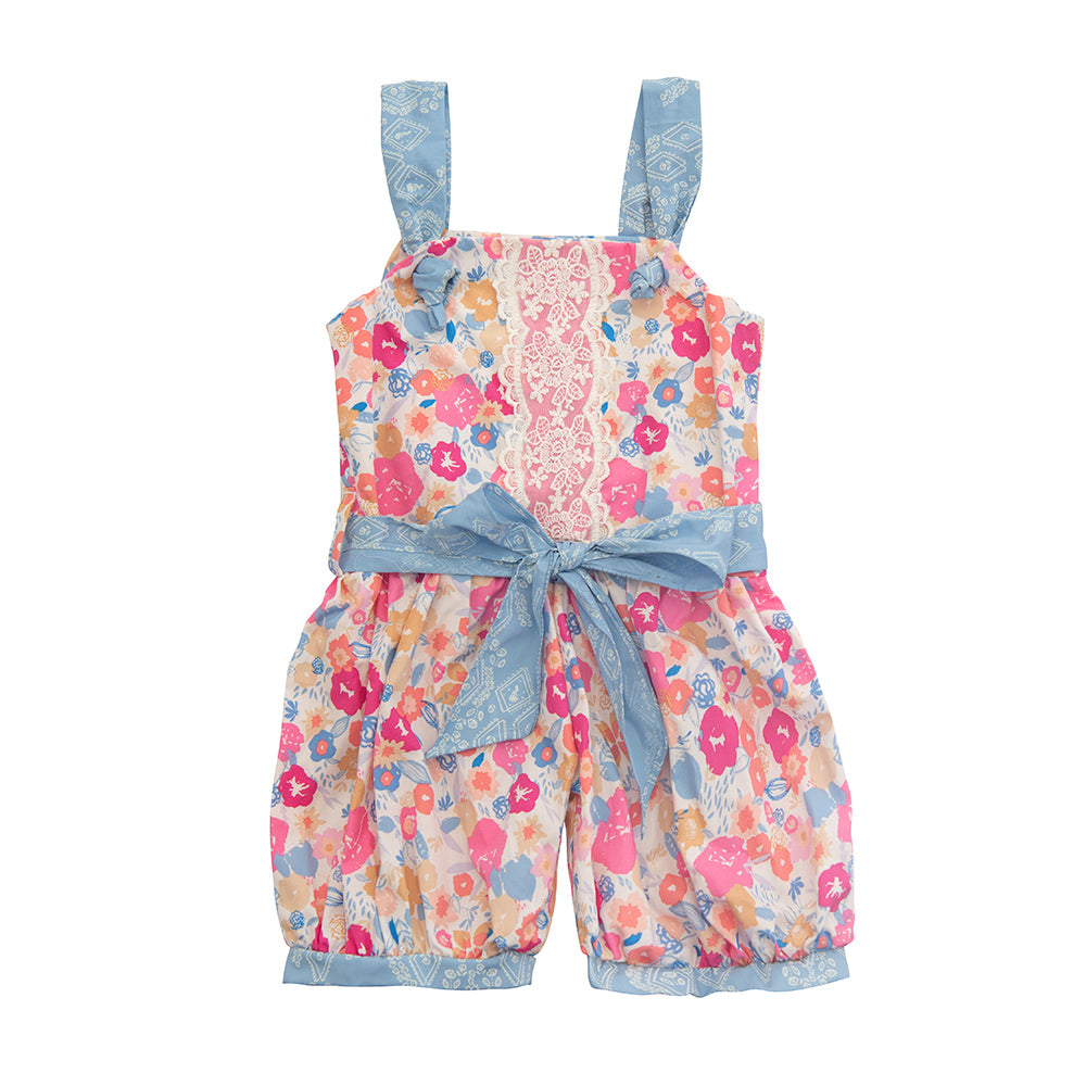 A stylish Bandera Blossom Romper featuring a vibrant floral pattern, perfect for summer outings.