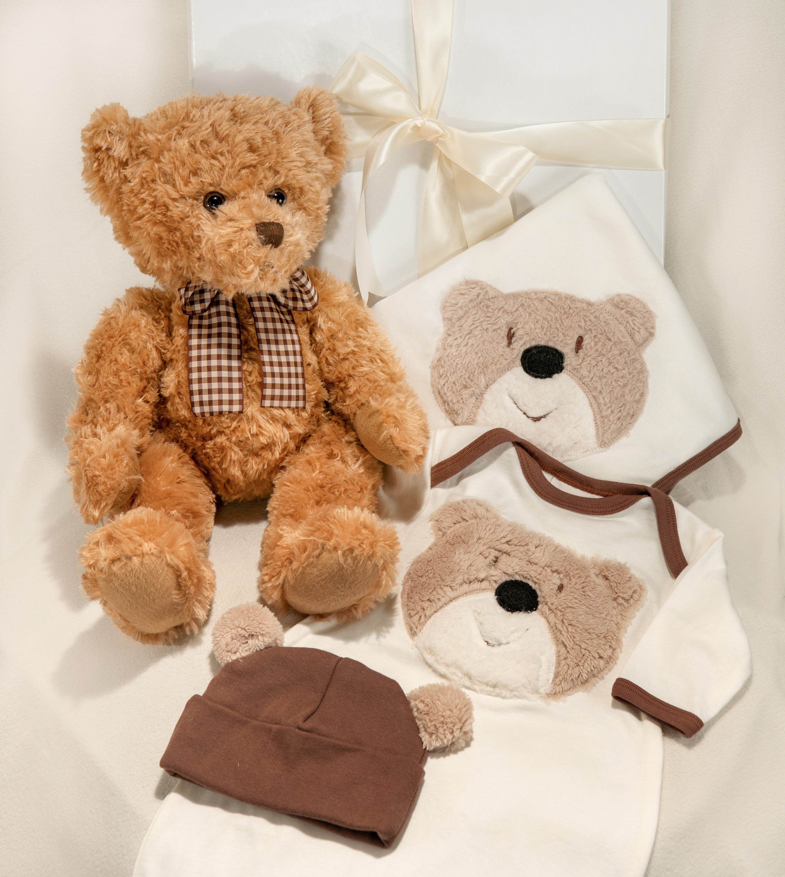 Bear Wear gown set featuring a gown, cap, blanket, and plush toy, perfect for newborns.