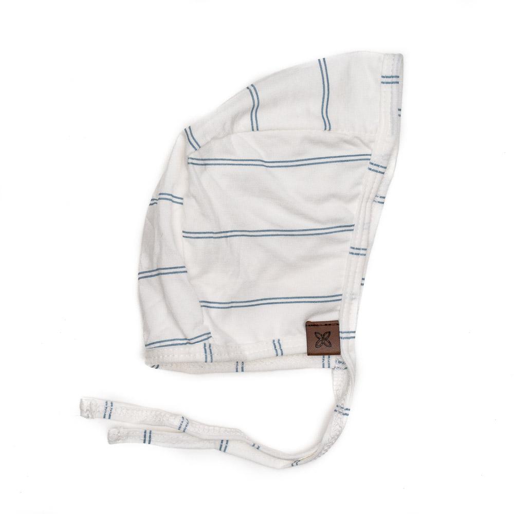 A cozy baby bonnet designed for warmth and comfort, featuring soft fabric and a snug fit, perfect for chilly weather.