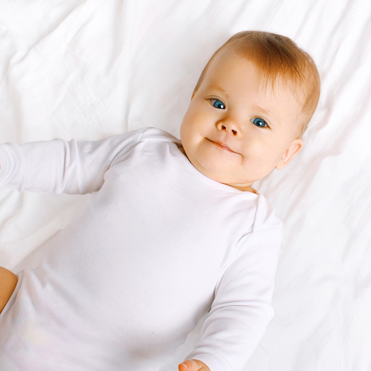 Boys' 3 Piece Layette Set featuring a soft blue infant gown made from 100% cotton, designed for comfort and easy dressing.