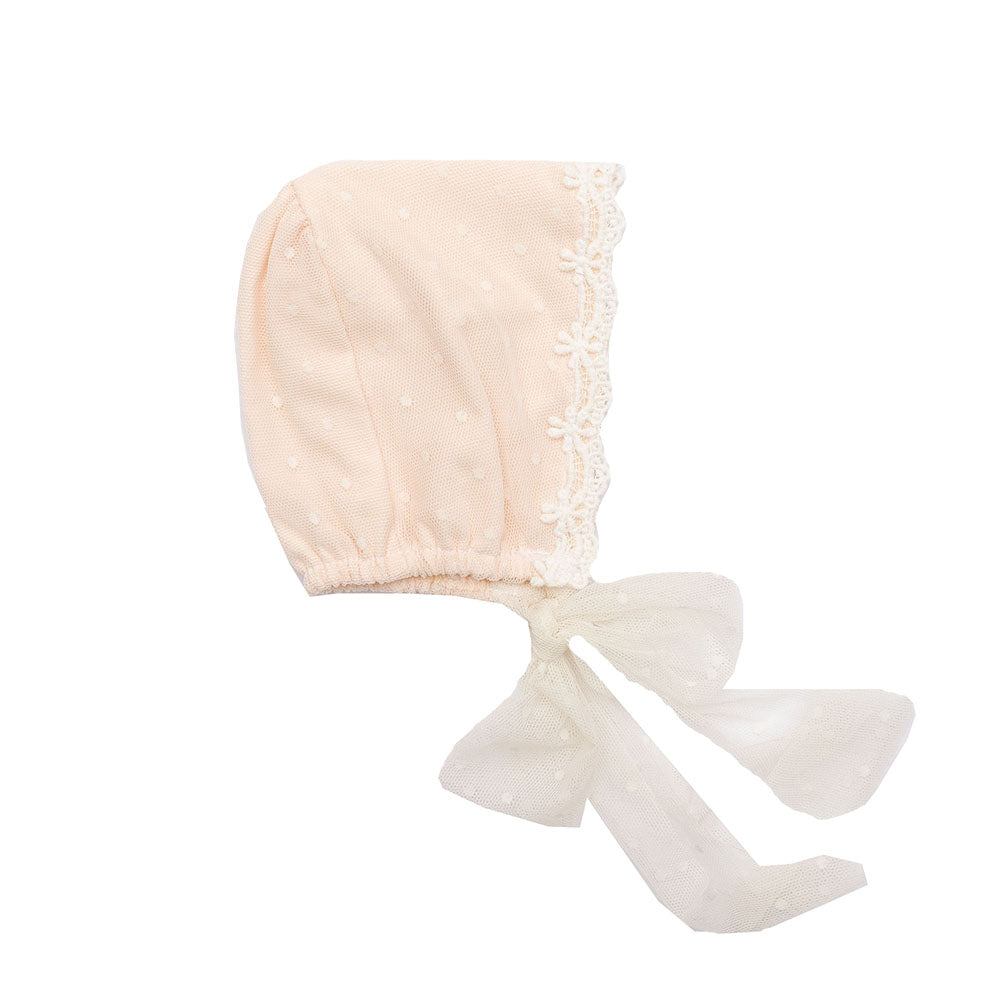 A stylish Caroline Bonnet in soft fabric, elegantly designed for versatile wear.