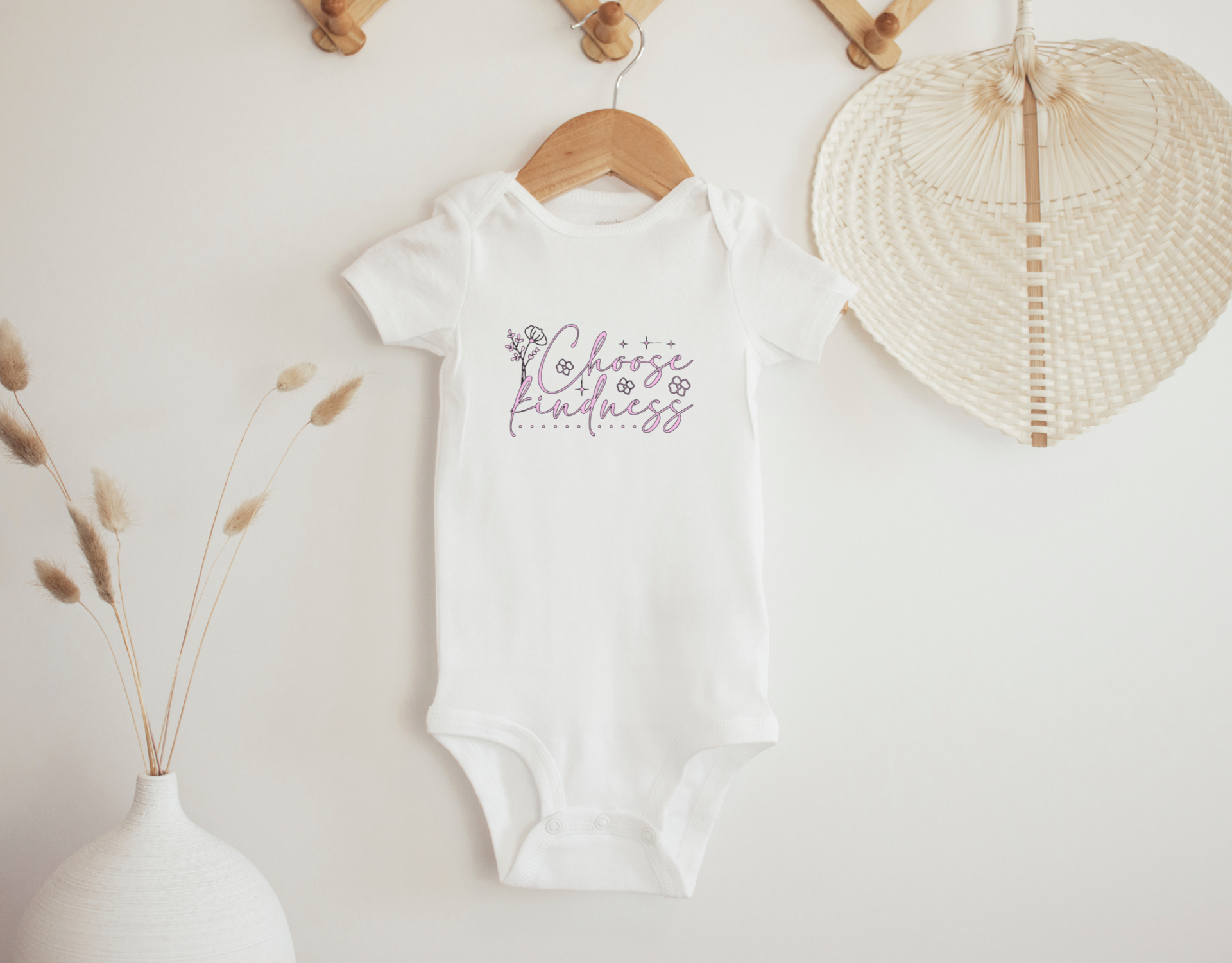 Choose Kindness Bodysuit for newborns, featuring a cute design and made from 100% cotton, perfect for gifting.