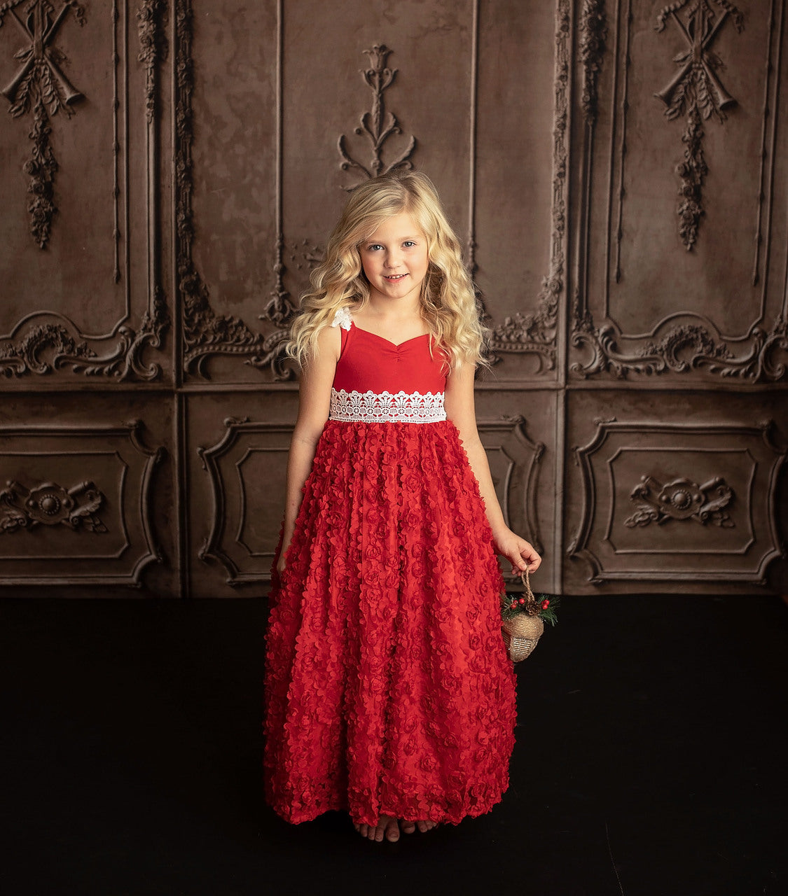 A beautiful red holiday maxi dress for girls, featuring a flowing design and elegant style, perfect for festive occasions.