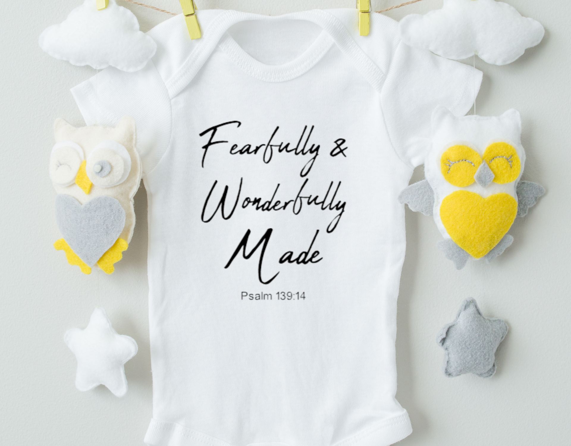 Fearfully and Wonderfully Made Cotton Baby Bodysuit in soft cotton with expandable neckline and snap closure.