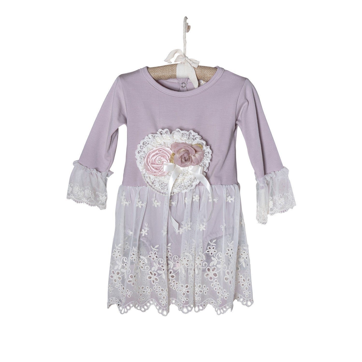 A beautiful creamy purple diaper dress with classic lace detailing, perfect for babies.