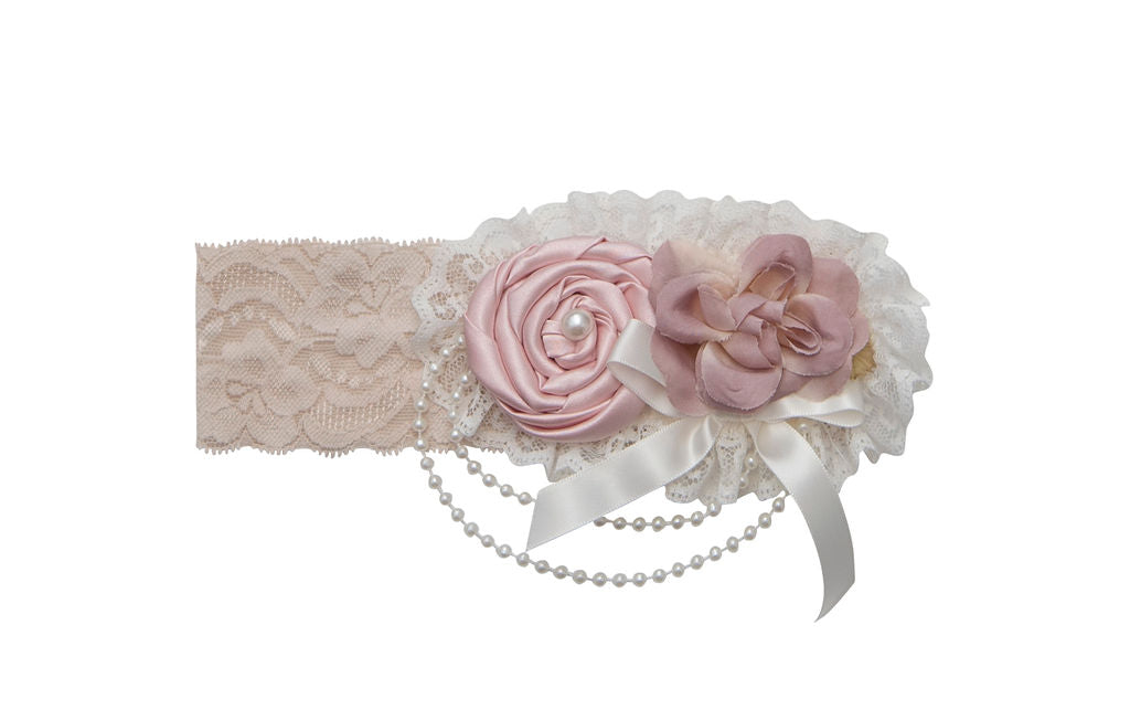 Genevie Headband featuring creamy purple hues and classic lace design, perfect for stylish outfits.