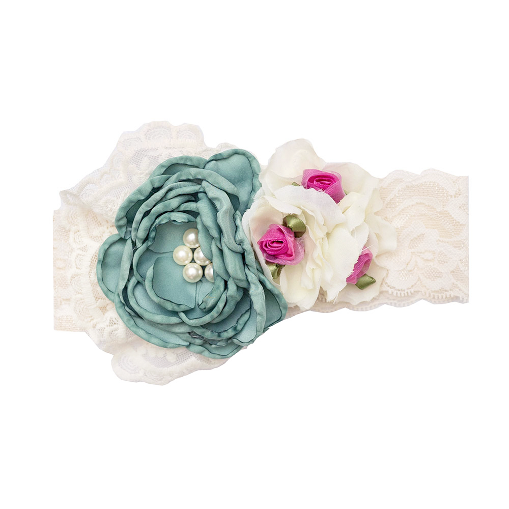 Harper Headband featuring a turquoise flower with lace and rosettes, perfect accessory for stylish outfits.