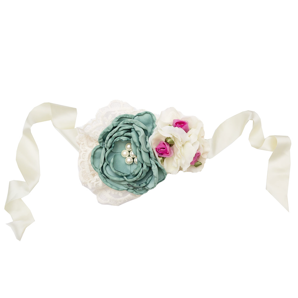 Harper Sash featuring a turquoise flower with lace and rosettes, elegantly styled for a fashionable look.