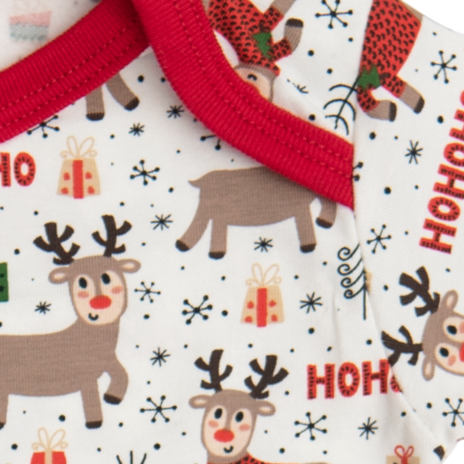 A cozy Holiday Magic Footie for boys featuring festive designs and easy snap closures, perfect for winter celebrations.