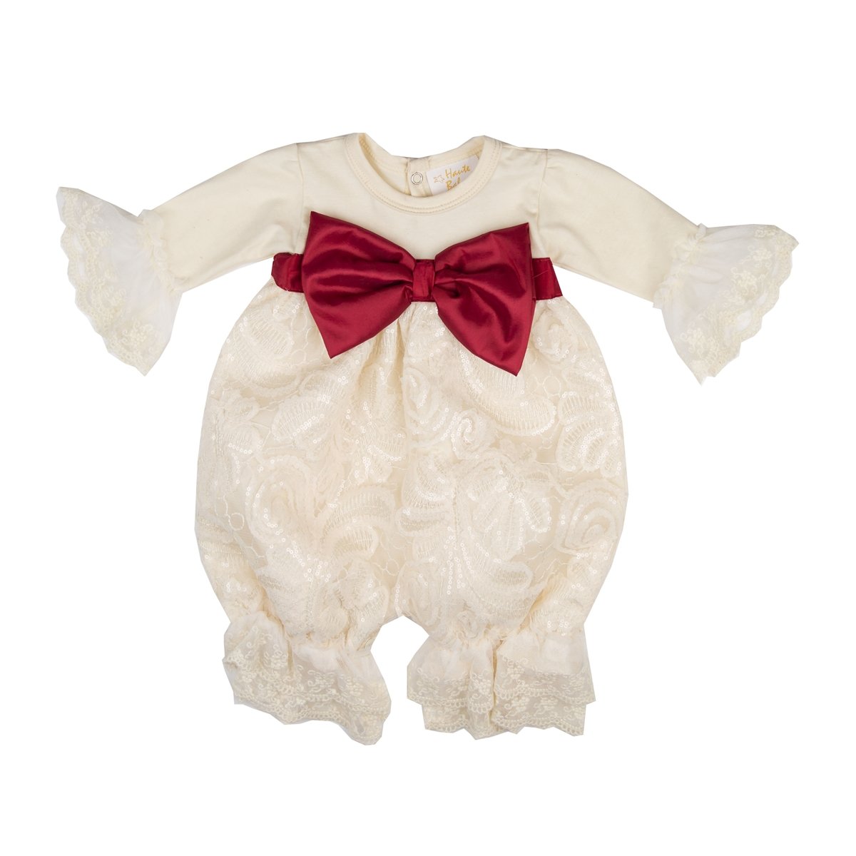 A stylish Holiday Sparkle Romper featuring shimmering embellishments, perfect for festive occasions.