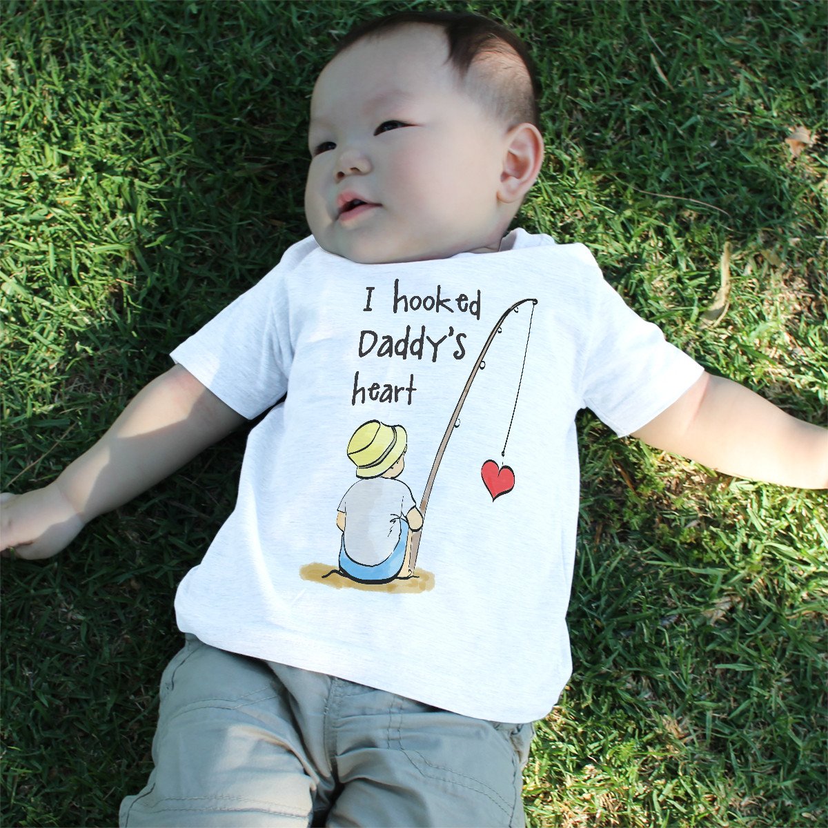 I Hooked Daddy's Heart Baby Shirt in soft cotton, featuring a cute fishing-themed design for infants.