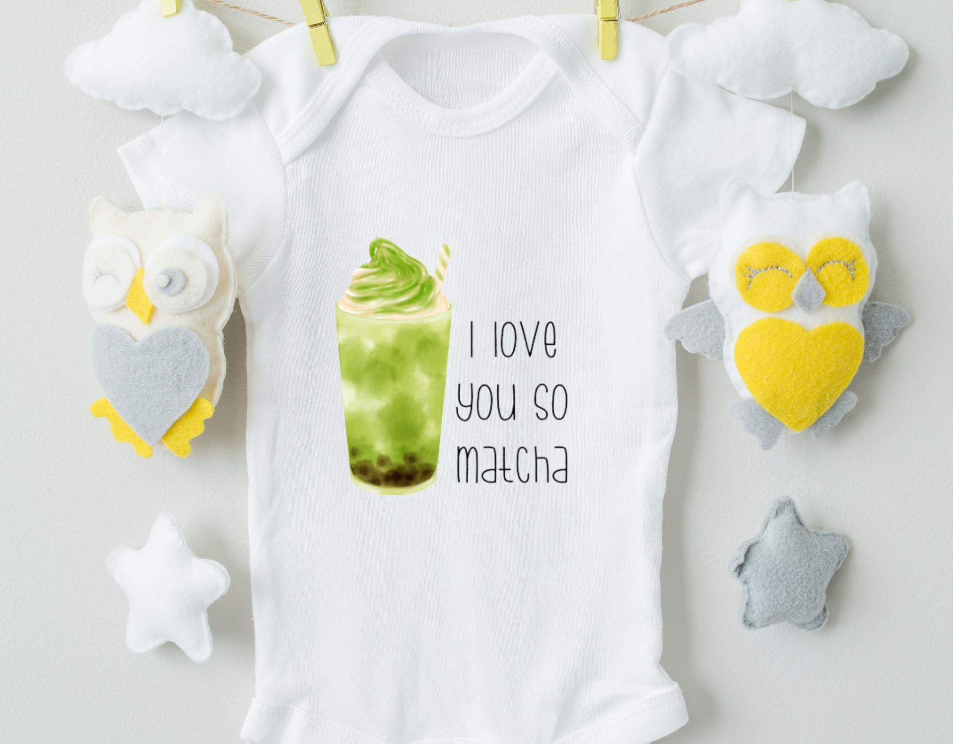 I Love You So Matcha Bodysuit in organic cotton with heat transfer vinyl design, featuring an expandable neckline and snap closure.