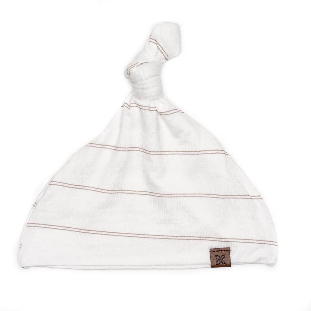 A soft, stylish knotted hat for babies, featuring a cute knot on top and made from a gentle fabric blend, perfect for keeping little heads warm.