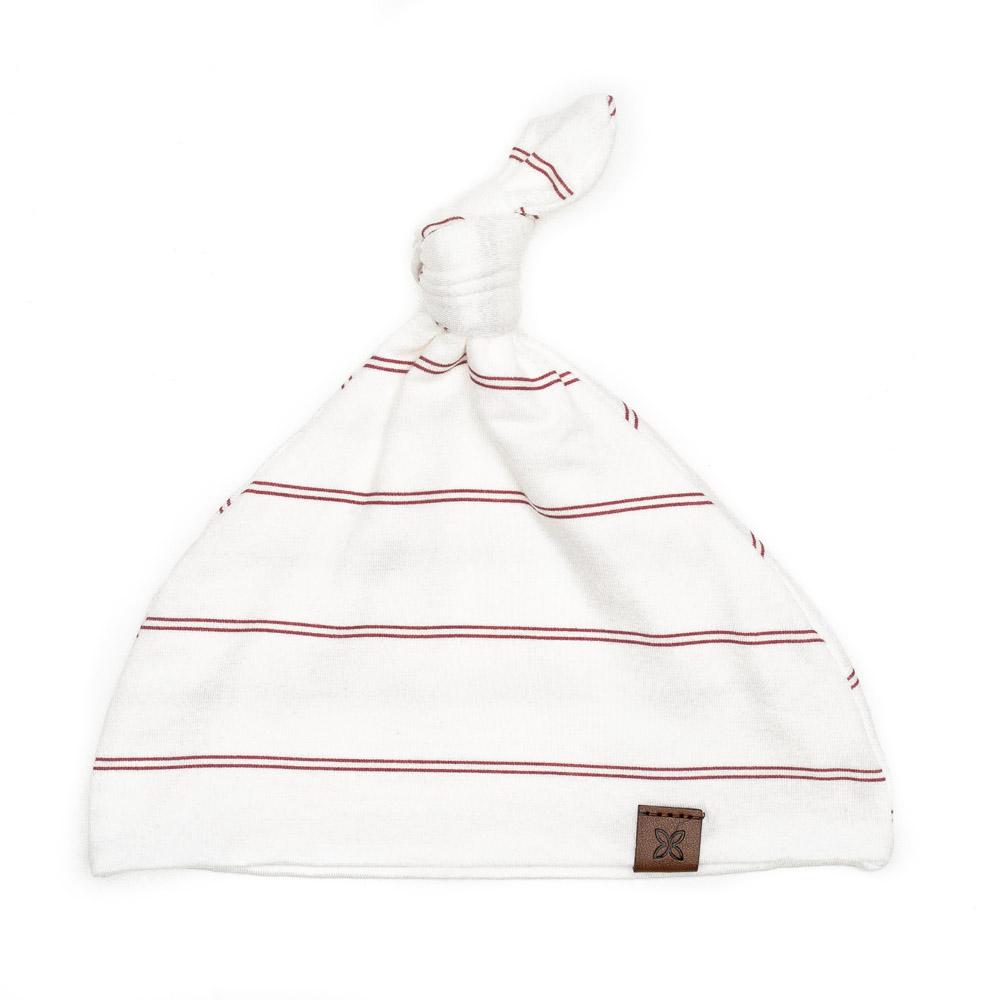 A soft, stylish knotted hat for babies, featuring a cute knot on top and made from a gentle fabric blend, perfect for keeping little heads warm.