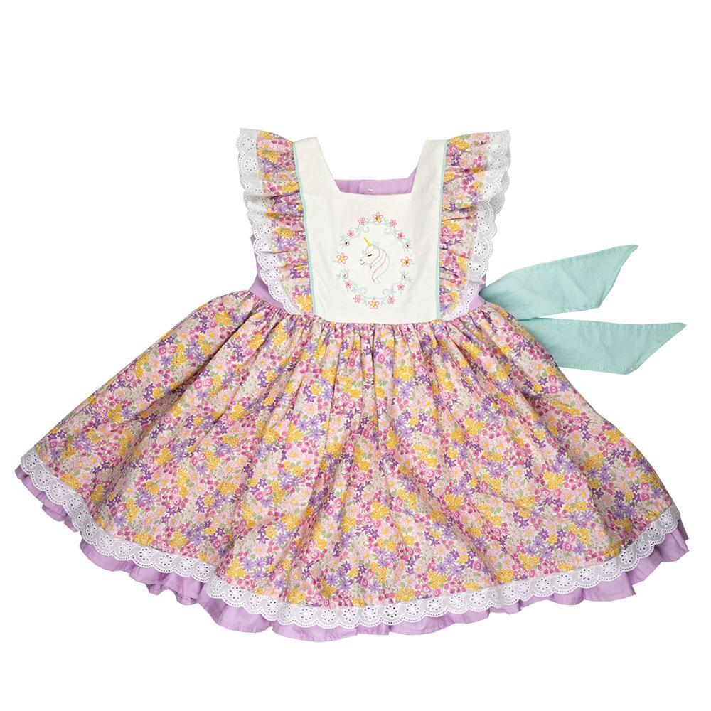 A colorful unicorn-themed dress for little girls, featuring a vibrant design with a unicorn print, perfect for imaginative play and special occasions.