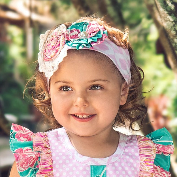 Lily's Lawn Headband featuring an elegant design in various colors, perfect for any occasion.