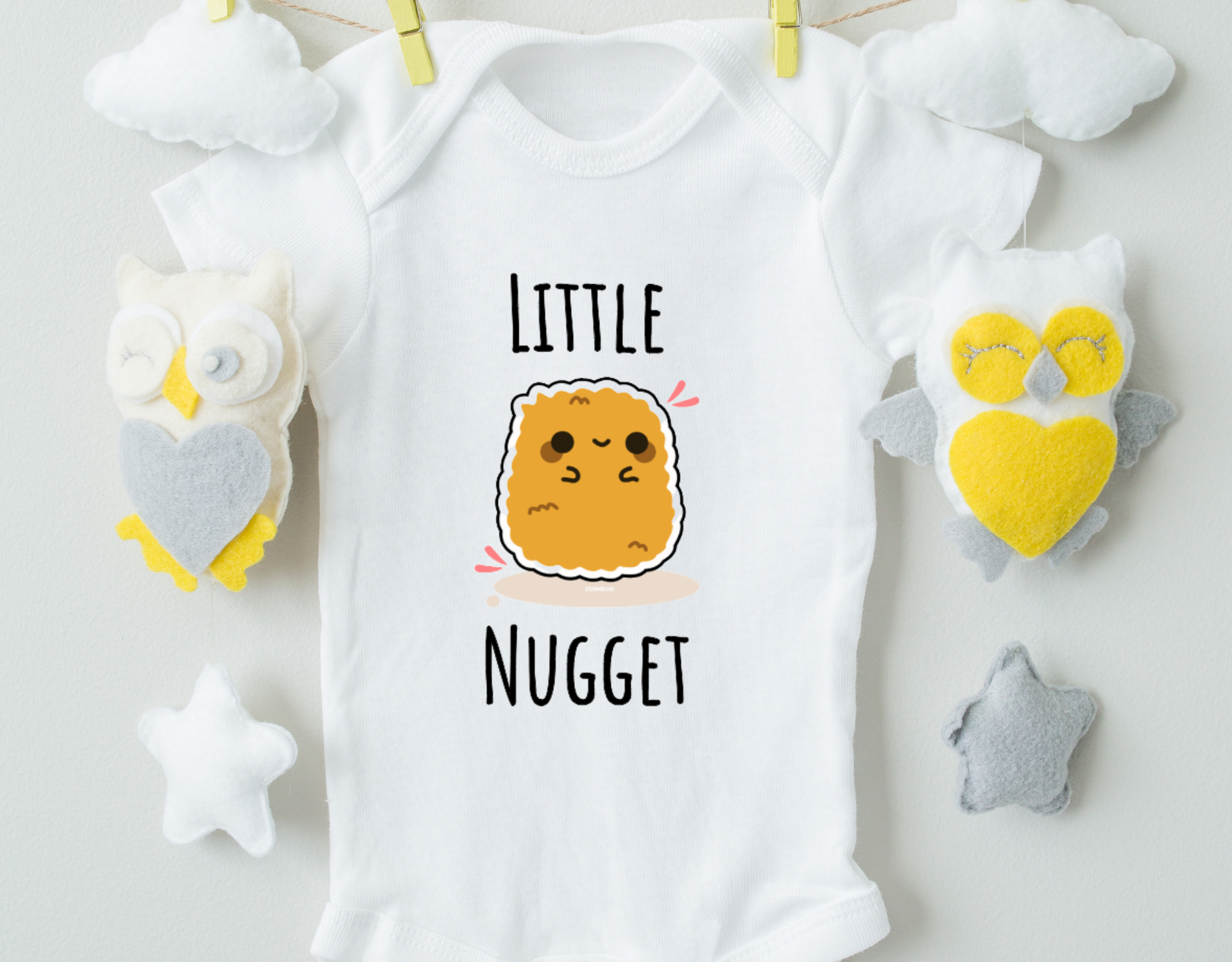 Little Nugget Cotton Baby Bodysuit in soft cotton with expandable neckline and snap closure, perfect for infants.