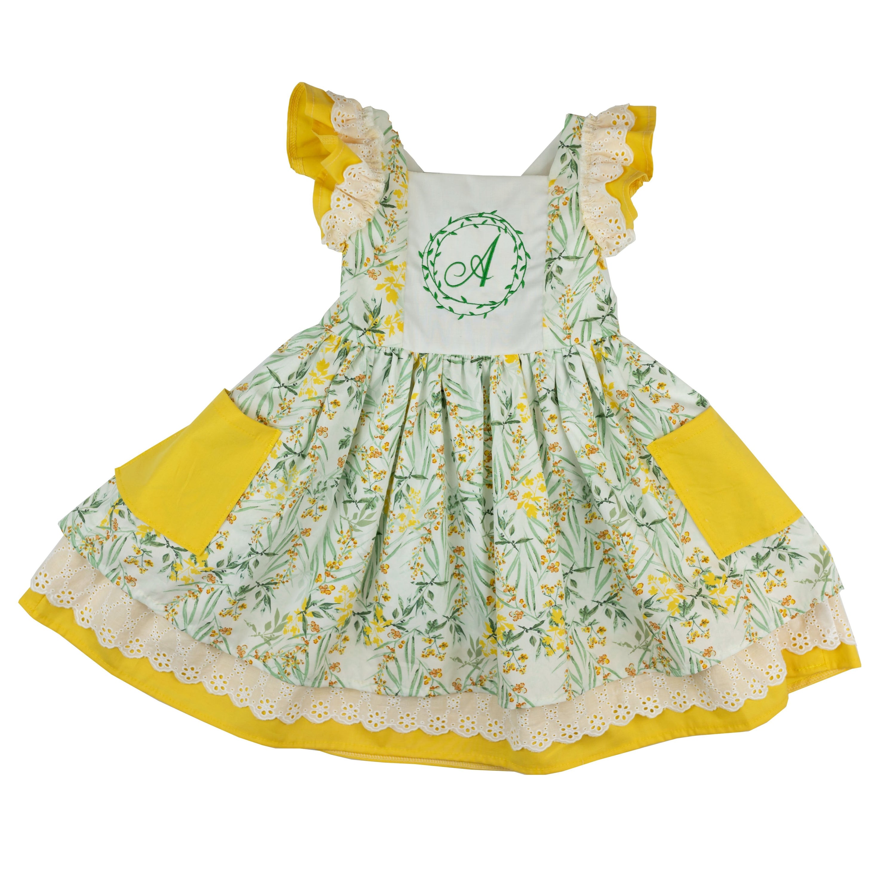 A vibrant Little Sunshine Dress featuring bright colors and a playful design, perfect for sunny days.