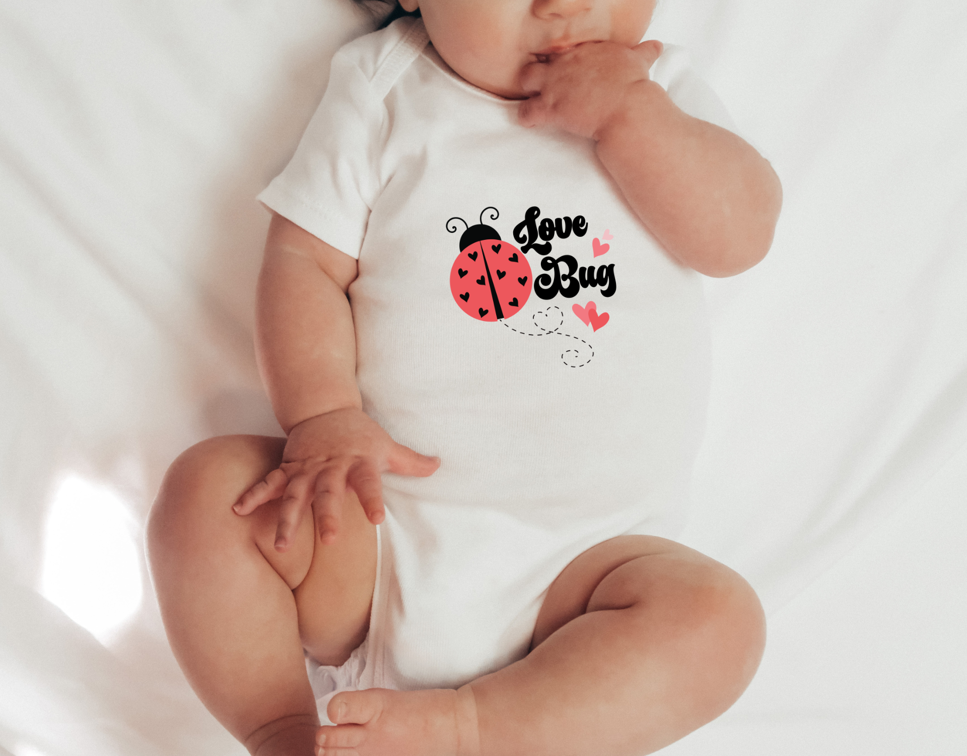 Adorable Love Bug Bodysuit for babies, featuring a cute love bug design on a soft cotton onesie.