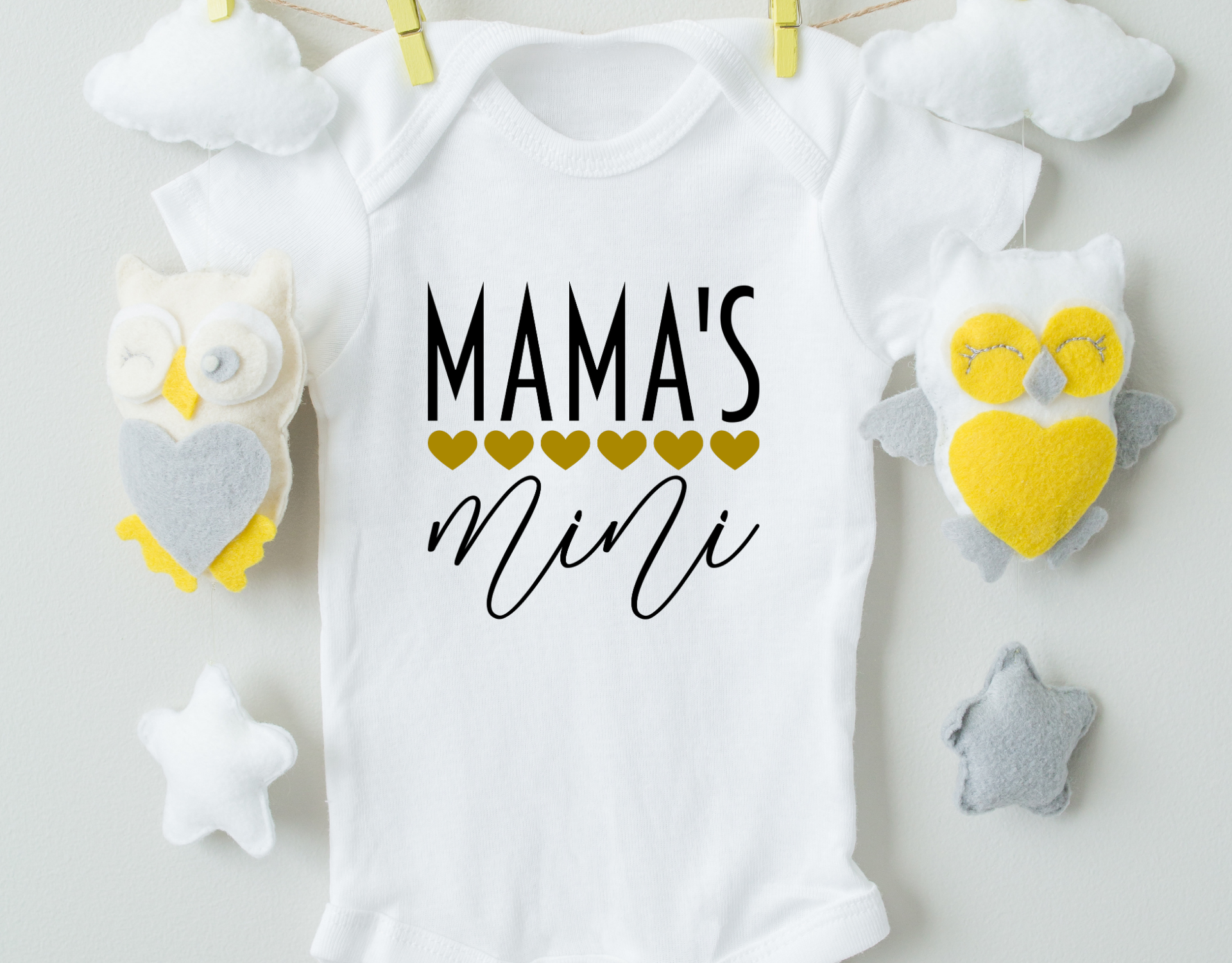 Mama's Mini Cotton Baby Bodysuit in soft cotton with heat transfer vinyl design, featuring expandable neckline and snap closure.