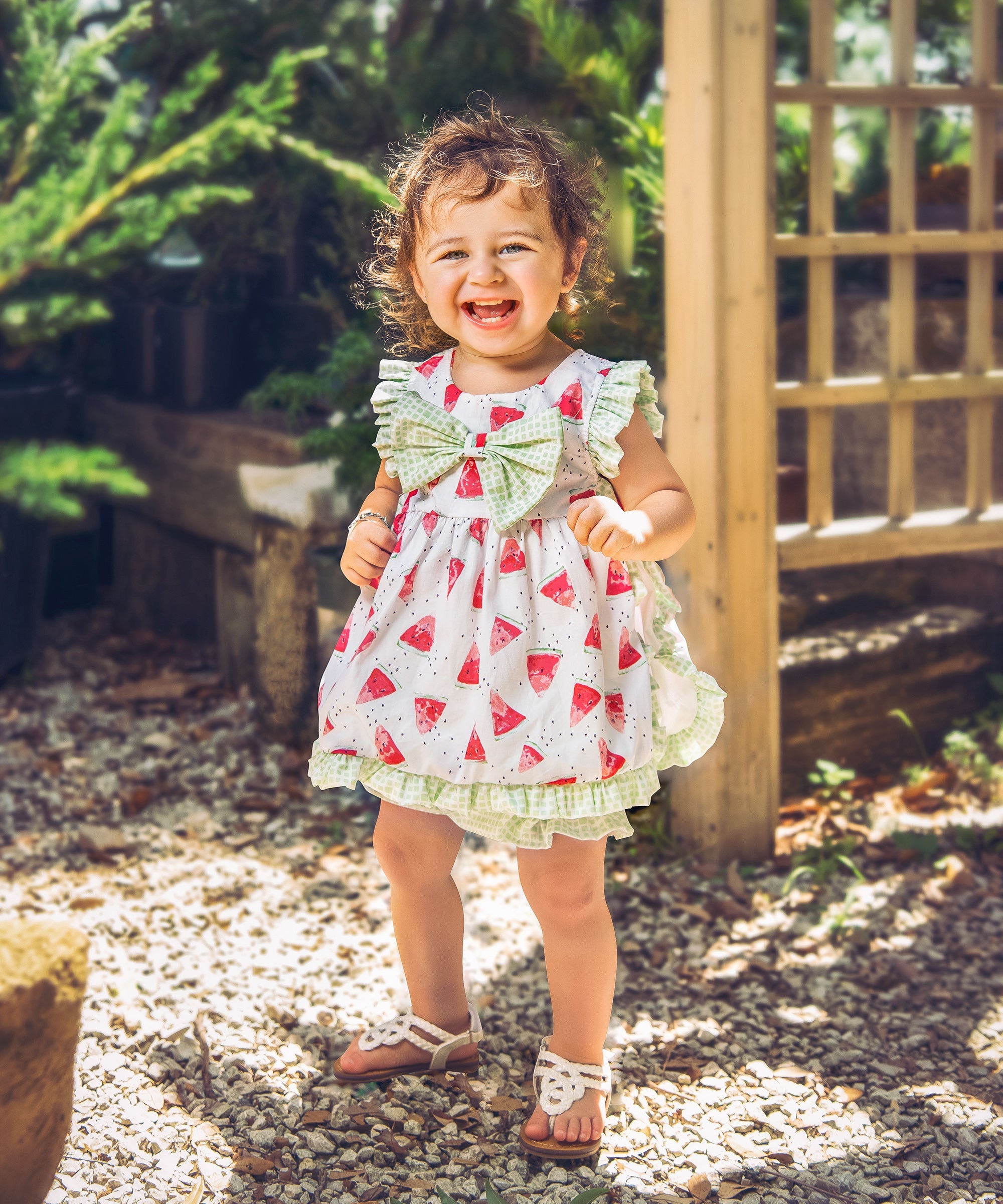 Mia's Melons Apron Set featuring a vibrant melon pattern, adjustable neck strap, and matching kitchen accessories.