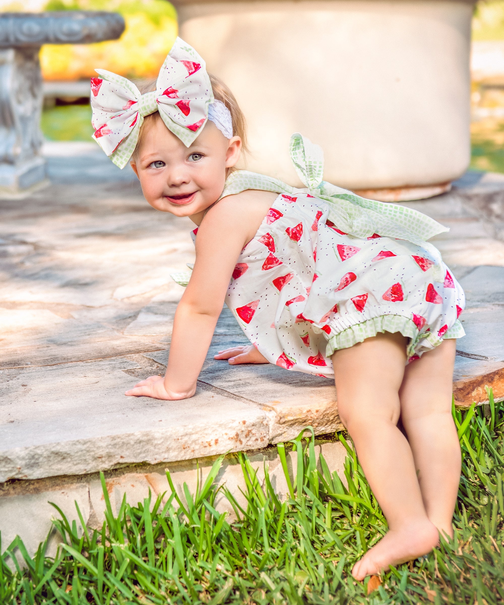 Mia's Melons Romper featuring a vibrant melon print, perfect for summer outings.