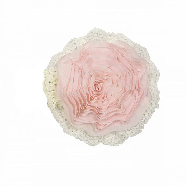 A soft pink headband designed for comfort and style, perfect for keeping warm during chilly weather.