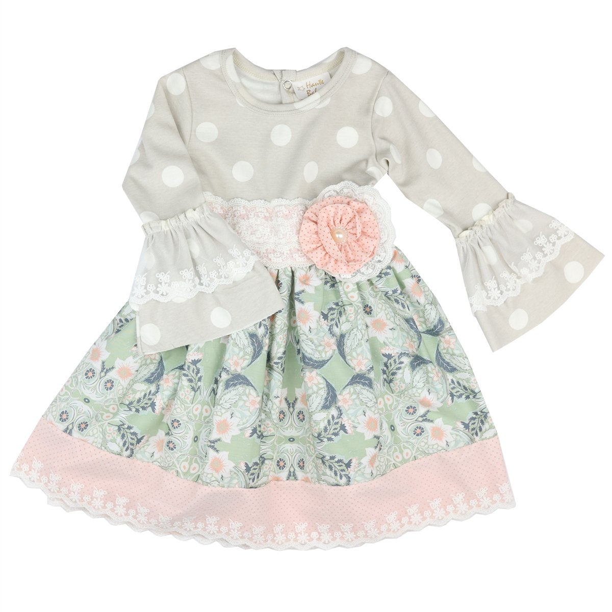 A stylish Polka Dreams Dress featuring a playful polka dot pattern, perfect for various occasions.