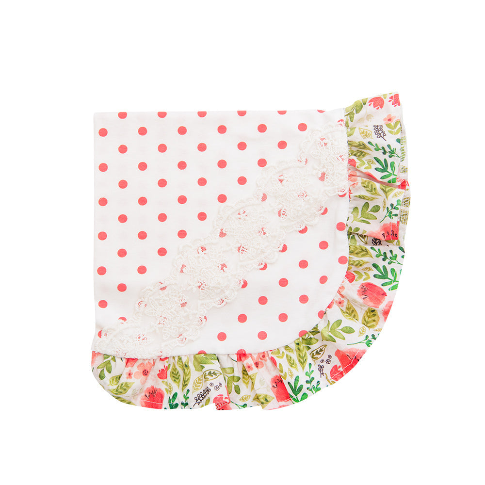 A cozy Poppy Garden Blanket featuring vibrant floral patterns, perfect for home decor and outdoor use.