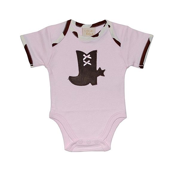 Rodeo Queen Baby Girl Short Sleeve Onesie featuring a cow pattern and boot design, perfect for little cowgirls.